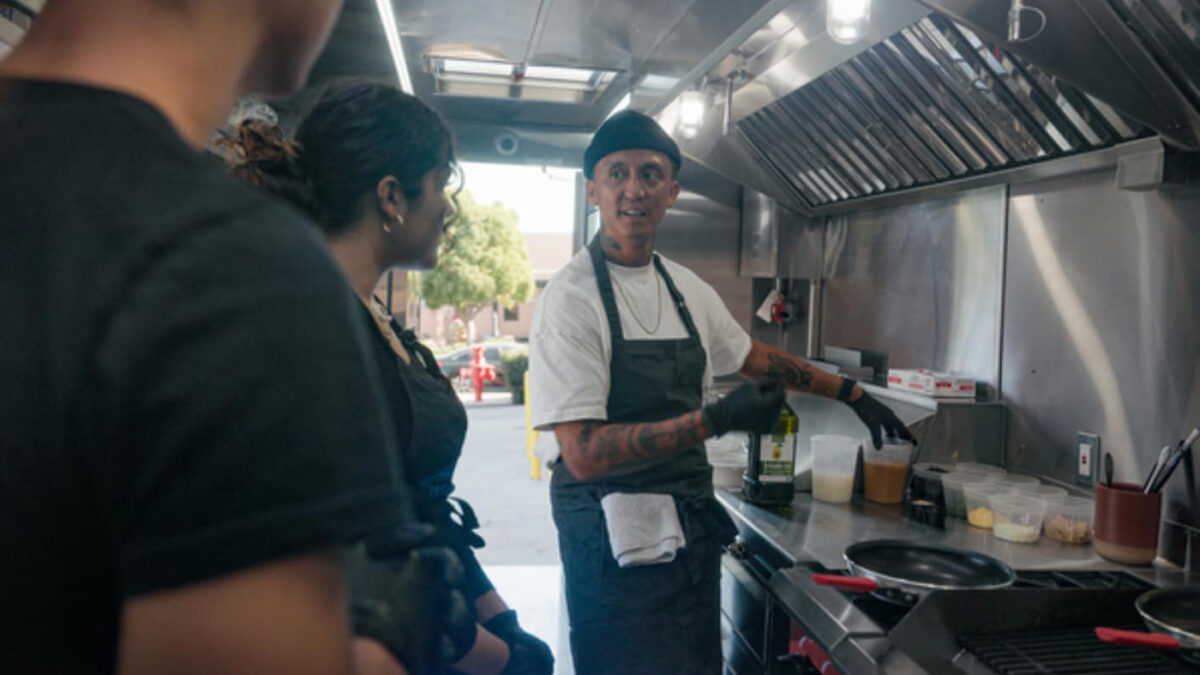 Chef Phillip Esteban with culinary students at Morse High School