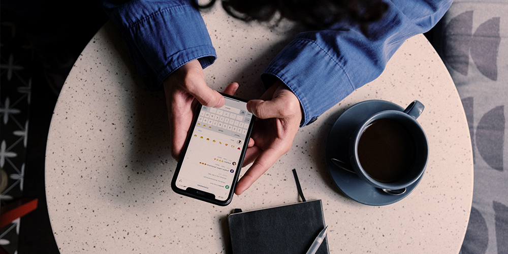 A woman holding a smartphone